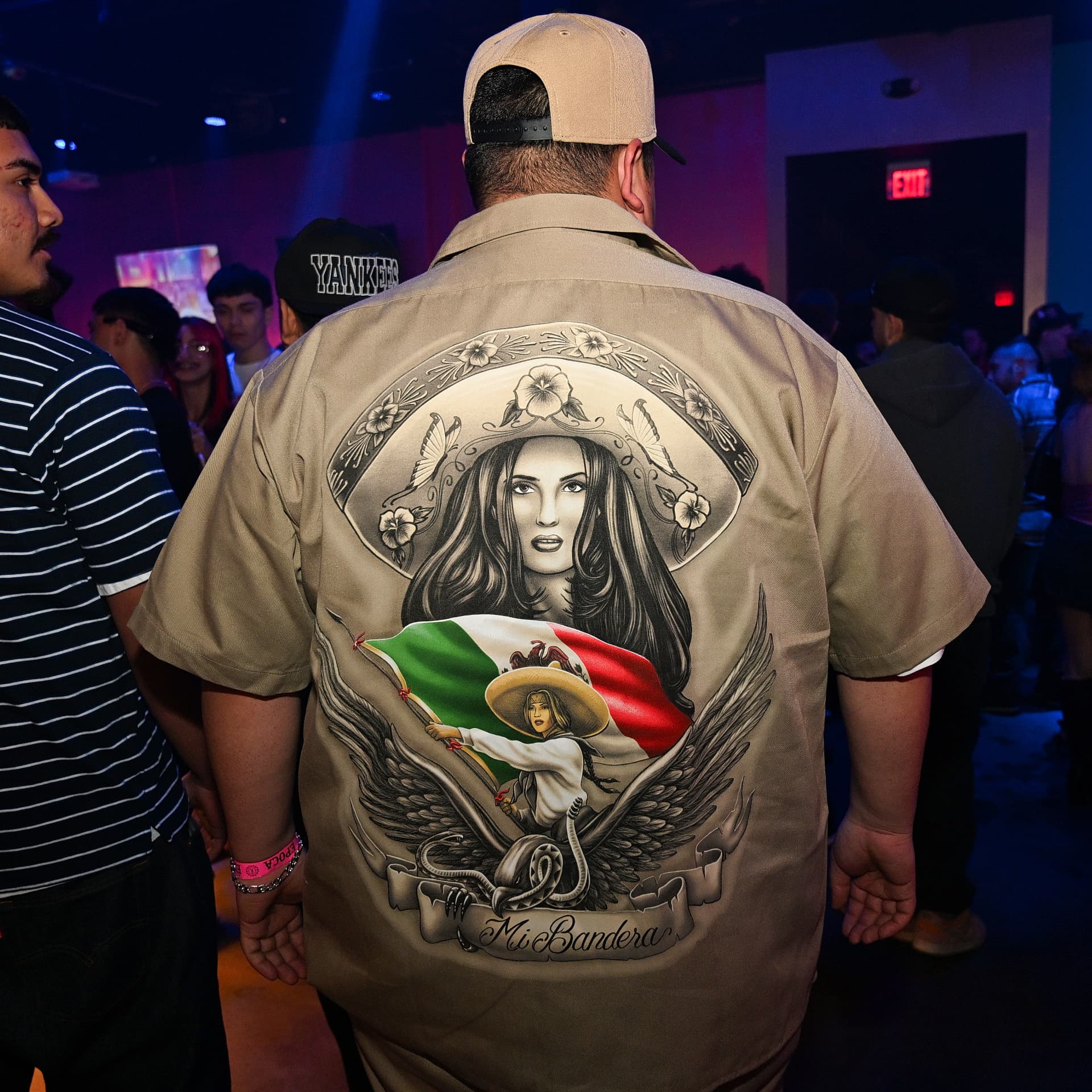 Guest on the dance floor at Época Cantina, Omaha